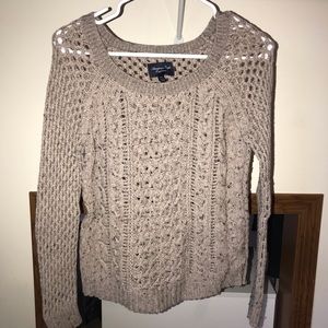 light brown sweater